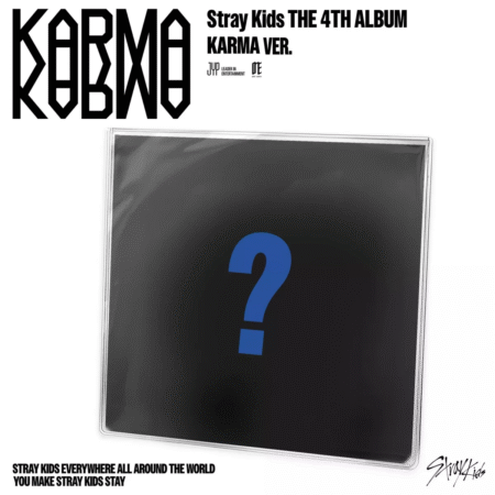 Stray Kids Karma Ver. CD package with photobook, photocards, wristbands, and binder set laid out